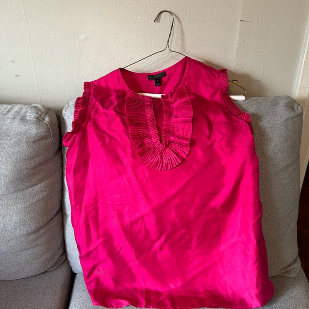 A beautiful fuschia pink top in silk on worn a few times .
